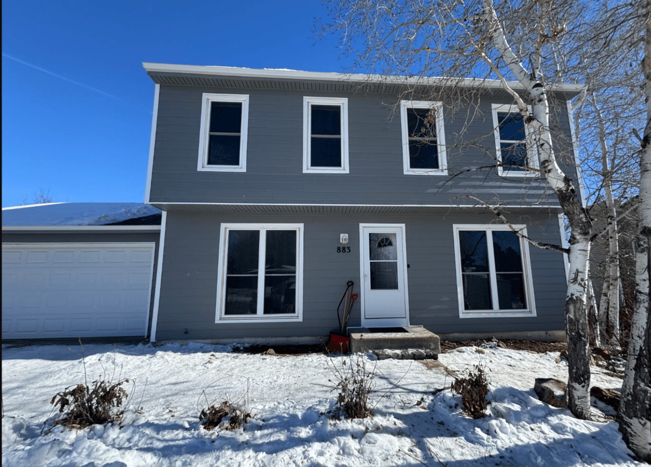 Two-Story Gray Siding & White Windows — Siding project in Colorado
